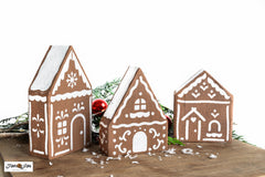 Create a dreamy holiday scene with the Gingerbread Village stencil! Included are three charming gingerbread houses with hand-drawn icing details. Included is a sky scene if stenciling on a flat surface, or use the additional stencil pieces designed to fit perfectly on cut 2x4s to create 3D houses.&nbsp;

Or choose one of our two custom MDF wood kits to either create ornaments and a banner or a standing village!
