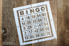 BINGO - Star stencil by Funky Junk's Old Sign Stencils is a bingo card styled stencil to get the vintage vibe on your projects! This design showcases a bold BINGO title, borders, and numbers within a grid. Stencil artwork, tote bags, throw pillows, trays and more! Offered in small and large.