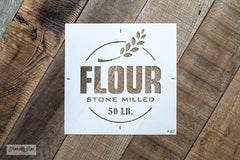 Flour Stone Milled 50 LB is a vintage-styled grain sack stencil. Team it up with Grain Sack Stripes for the complete authentic look! Complete with a sprig of wheat. By Funky Junk's Old Sign Stencils.