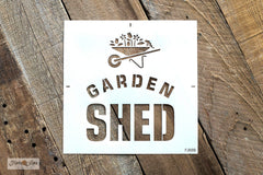 Garden Shed stencils by Funky Junk's Old Sign Stencils helps create a garden sign that will turn a plain garden shed into a beautiful backyard feature! 3 options of square or vertical signs, designed with bold text and a whimsical wheelbarrow filled with overflowing flowers for that perfect decorative garden touch!