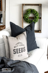 Learn how to stencil this vintage-inspired Wild Flower Seeds grain sack pillow with an Ikea pillow cover! Showcasing Wild Flower Seeds and Grain Sack Stripe GL4 from Funky Junk's Old Sign Stencils.