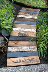 Learn how to make this charming garden walkway from scrap wood and garden-themed Funky Junk's Old Sign Stencils! Click for stencils and full tutorial.